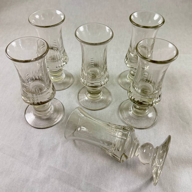 A set of six authentic French Bell Epoque Era Absinthe glasses, circa 1890-1910. These heavy glasses were used in French...