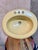 Vintage 1979 porcelain bathroom sink. Lovely pale yellow, butter, light harvest color. Self rimming drop in sink features...
