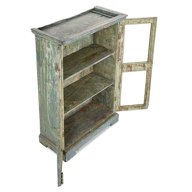 This patinated solid wood display case has an authentic and timeless aesthetic, testifying to a time when each piece of...