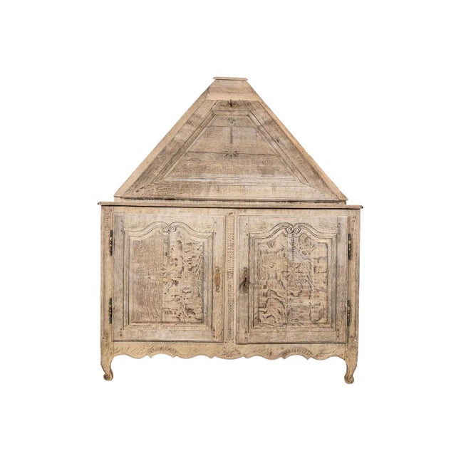 Bleached Oak corner cabinet with hand carved details. Two lower shelves and hutch with single drawer. France Circa 1850