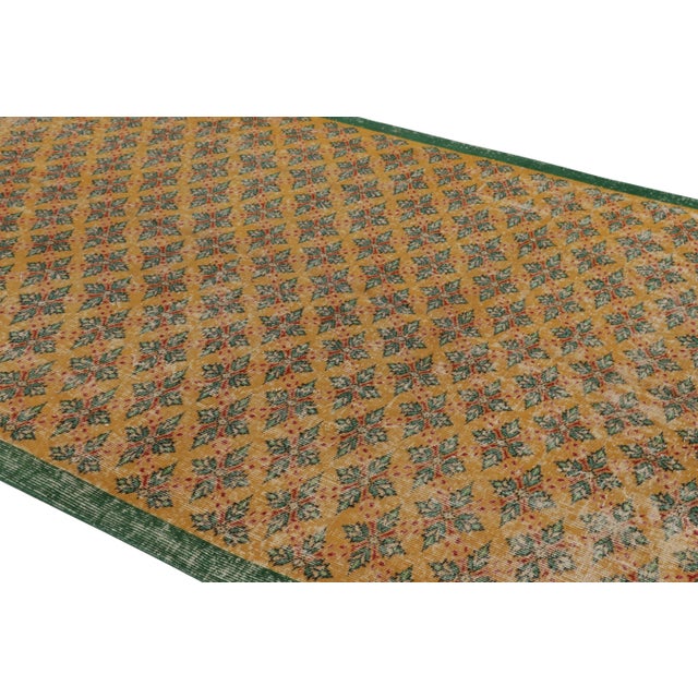 This vintage rug is a 6x10 Turkish distressed piece, made with hand-knotted wool circa mid-20th century. It is an exciting...