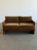 W60 D33.5 H31 SW55.25 SD20 SH18.5 AH23 This solid oak sling loveseat has been refinished and reupholstered in a mohair. It...