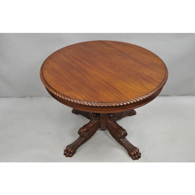 Antique French Empire Carved Mahogany Paw Foot Acanthus Pedestal Base Round Center Table with Carved Rope Edge. Appears to...