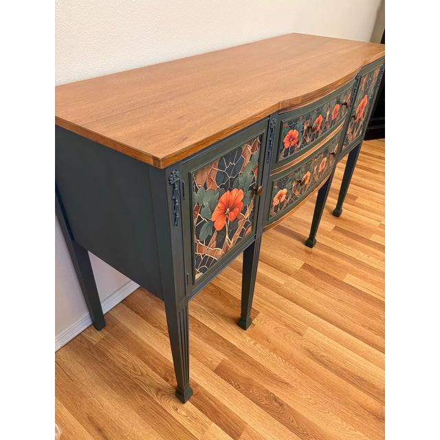 This vintage credenza featuring poppie's as the theme of the scene is quite stunning in the fact that it pops out at you...