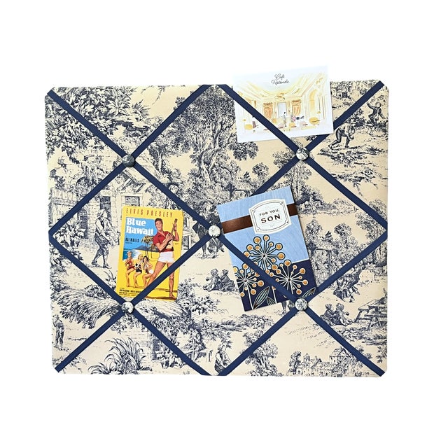 Bring a touch of timeless French country style to your home with this custom-made upholstered French memory board,...