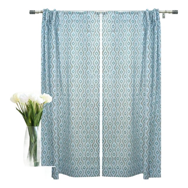 Bring artisanal charm to your interiors with this handcrafted Lehriya Ring Curtain. Made from soft, breathable viscose...