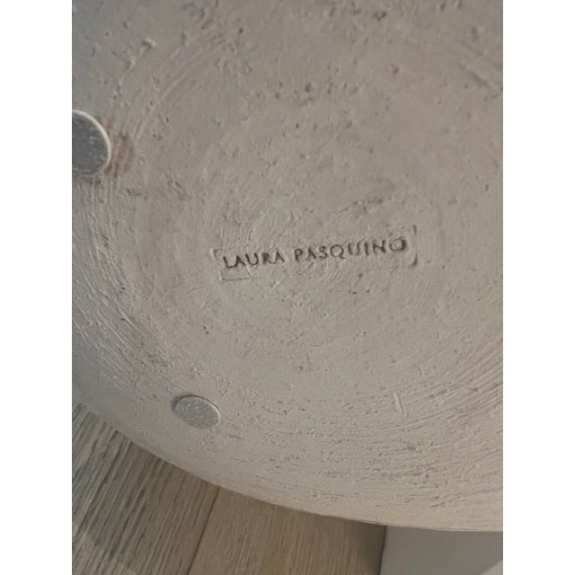 Dimensions: W 10.6” x D 10.6” x H 10.2 “ Finishing: glazed Color: beige and white Signature: artist stamp on the base...