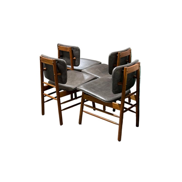 Incredible set of 4 mid century modern Greta dining chairs. Constructed in Denmark in a gorgeous teak wood mixed with a...