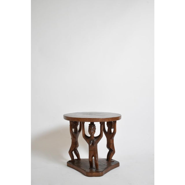 Monoxyl african pedestal round table, 1960s. Height: 52 cm - 20.47 in Diameter: 55 cm - 21.65 in