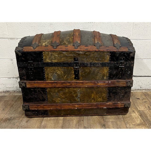 This is a beautiful antique camel back steamer trunk chest. Gorgeous wood and metal trunk that shows obvious signs of...