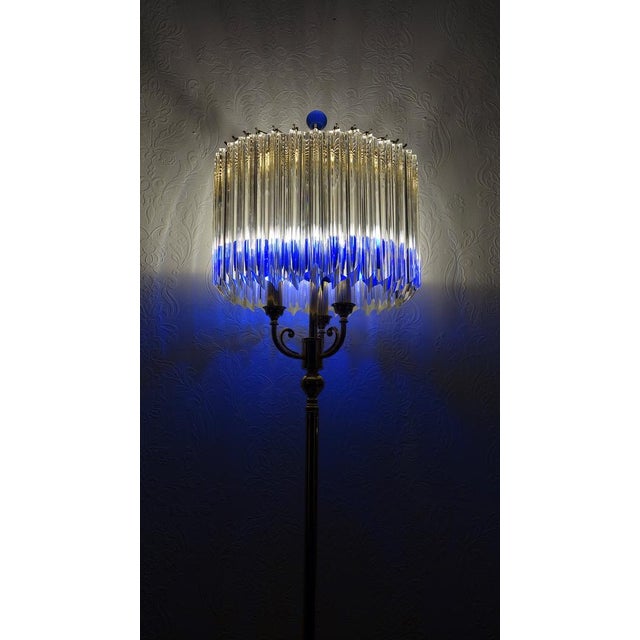 These 90s massive brass glass Murano glass Venini floor lamp is a striking and unique design. The combination of brass...
