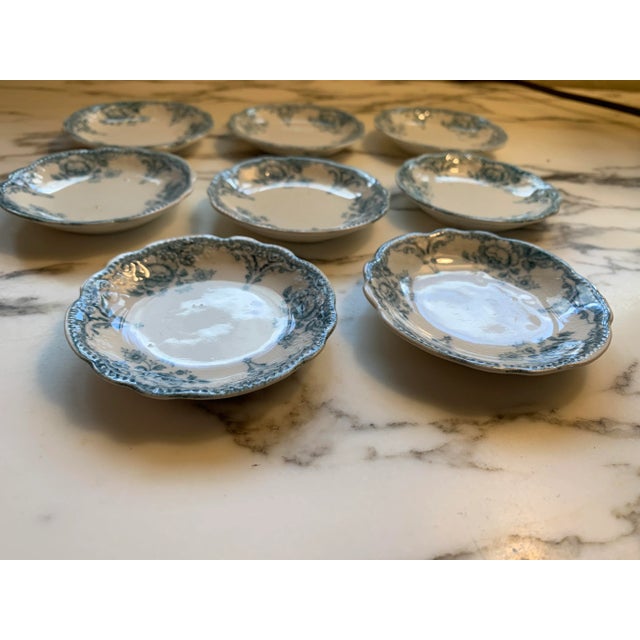 Here we have a set of gorgeous antique English teal transferware butter pats. Allerton's RUTLAND pattern is an absolutely...