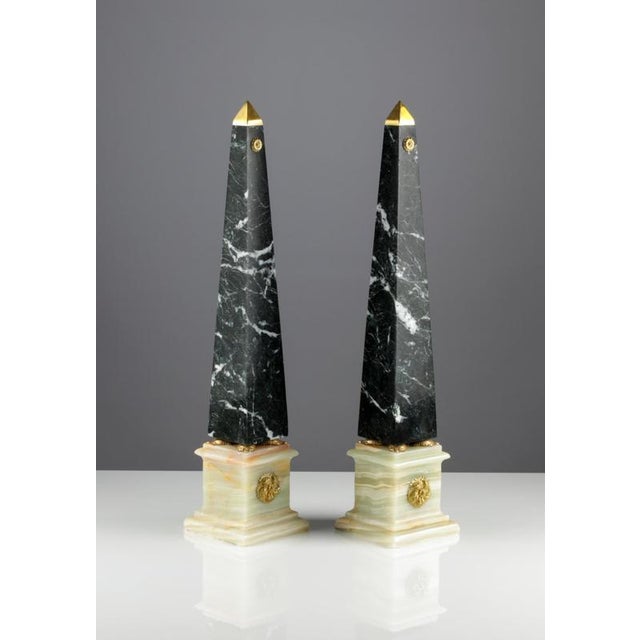 Pair of Large Decorative Italian Obelisks 20th Century Made of dark green, white-veined marble and onyx, bronze mounts in...