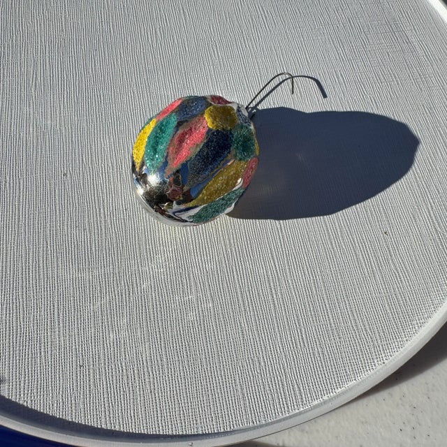 1950s colorful glass ornament, likely with European origins. Made with mica to add a little extra pizazz although this...
