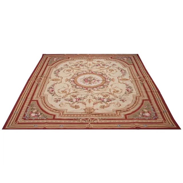 Hand-woven needlepoint rug featuring a French design with an elegantly woven center floral spray surrounded by bouquets of...