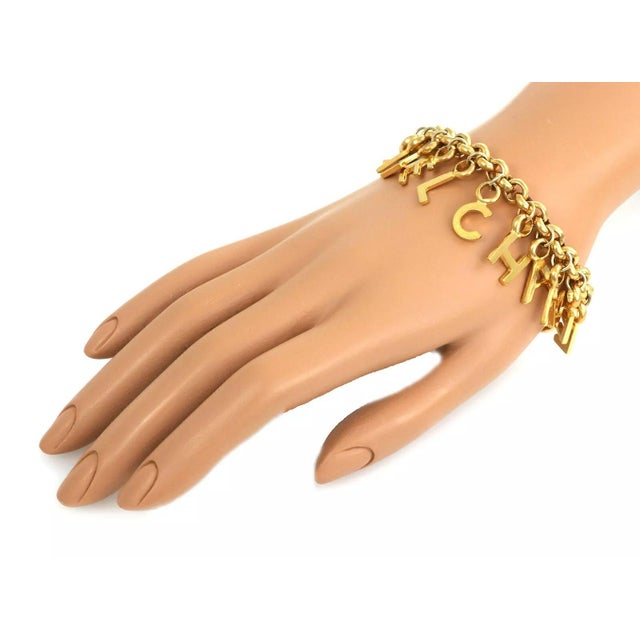 Chanel Vintage Chanel CC 1996 Multi-Letter Turnlock Dangle Charms Chain Bracelet 96p For Sale - Image 4 of 5