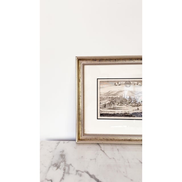 Believed to be a 1646 Engraving of the German city of Trier, purchased in Mainz, Germany. Features a generous scale and...