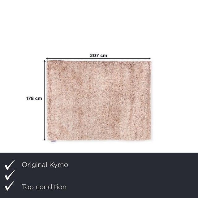 This Kymo wool rug is the perfect choice for those who love texture and textile depth in their rooms. with its elegant...