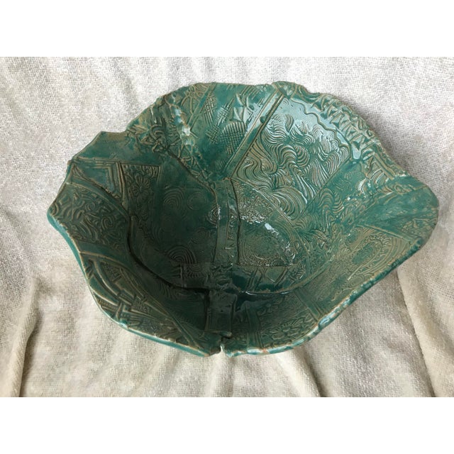 Vintage asymmetrical ceramic decorative bowl. Likely studio pottery. Handcrafted and signed “pat’s pots”.