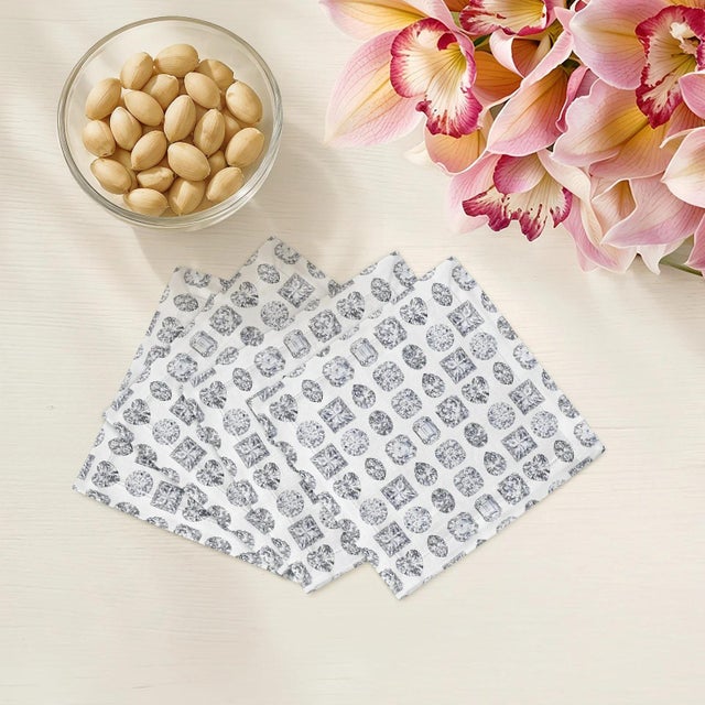 Radiating a brilliant, multi-faceted energy through its precise geometric pattern, this Bougie Diamonds Cocktail Napkins...