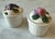 Pair of charming vintage ceramic jam pots featuring hand painted and embossed fruit lids with detailed berry and grape...