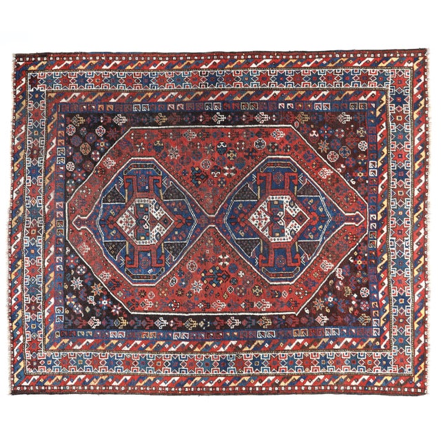 Antique Tribal Persian Rug with Geometric Medallions – Early 20th Century A striking antique tribal Persian rug featuring...