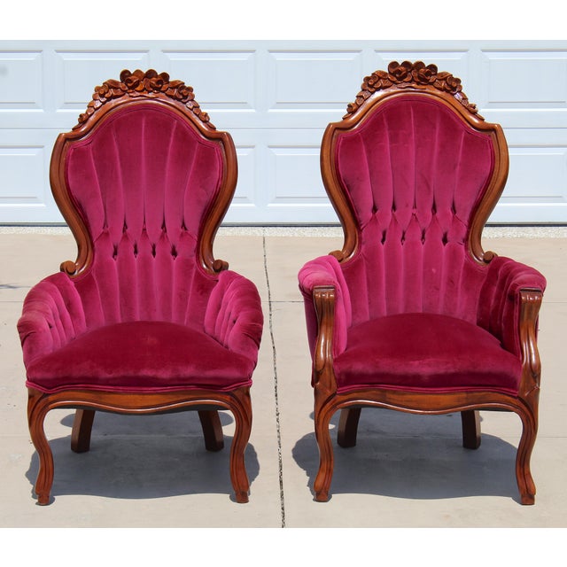 Elegant vintage Victorian Revival "His & Hers" (Gentleman & Lady) parlor chair pair featuring solid mahogany frames,...
