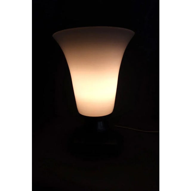 "Tulip Lamp 20th century" Lamp with square base in metal and important tulip in opaline signed Vincent Garnier in Paris....