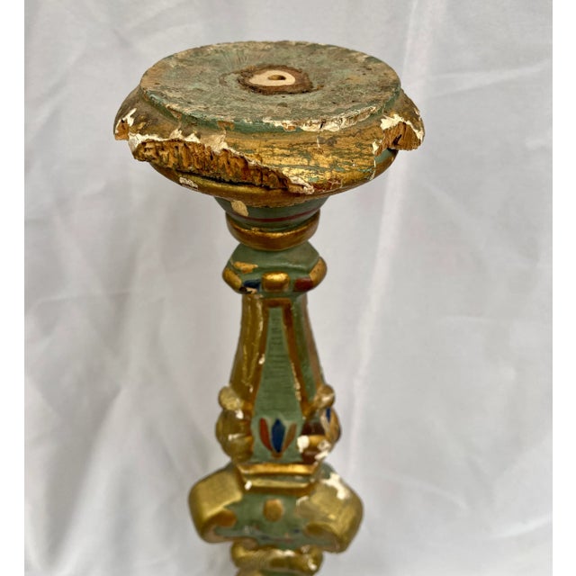 Imported from France. Antique 1800s polychrome carved wood altar candle. Triangle design decorated on all three sides....