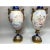 This stunning pair of mid-19th-century French Sevres porcelain vases is a true testament to the grandeur and refinement of...