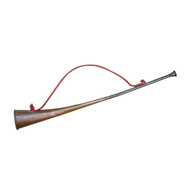 Mid to early 20th century copper coach horn / hunting horn with brass mouthpiece and red cord. Made in England....