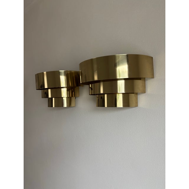 Pair Vintage Brass Mid Century Modern Cascade Art Deco Sconces. Some vintage wear. H: 7 inches W: 12 inches D: 6.5 inches
