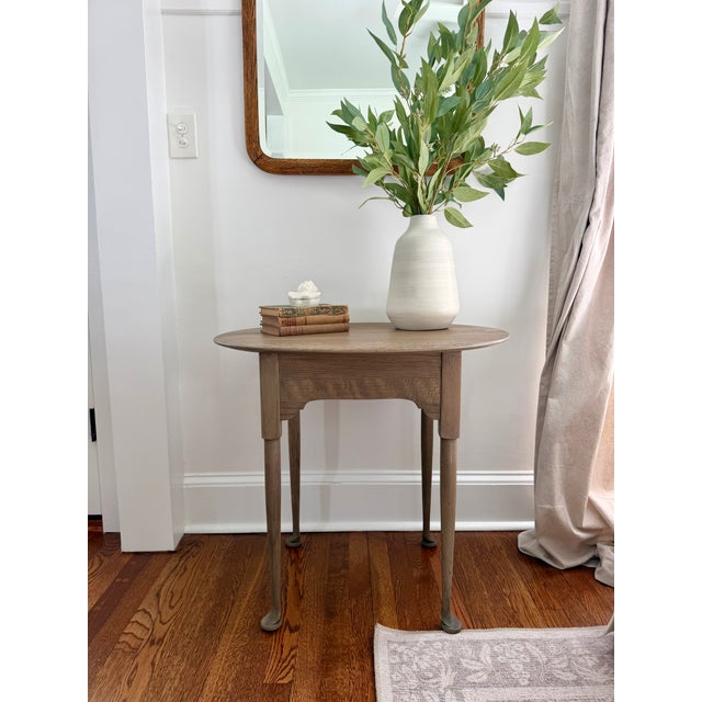 Vintage tiger oak Queen Anne style oval side table with a scalloped skirt and cabriole legs. The table has been refinished...