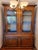 Dimensions in inches: 19d x 60w x 87h Baker Country French China Cabinet in excellent condition with movable shelves and...