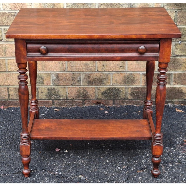 A Late Federal Style Mahogany Two-Tier Side Table, Circa first quarter of 18th Century Measures 30" in width, 20" in depth...