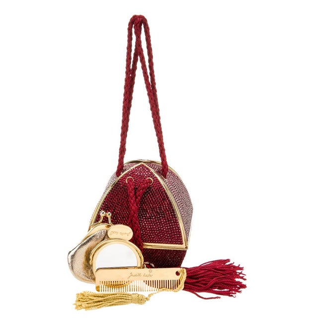 An exquisite evening MINAUDIERE by Judith Leiber in a rare Fortune Teller* inspired design enhanced by crystals and...