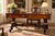 An impressive American Classical Revival mahogany library table, dating to approximately 1890–1925 and bearing a label for...