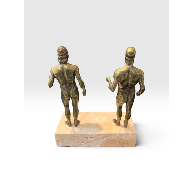 Striking vintage Italian sculptural group depicting the celebrated Bronzi di Riace, or Riace Warriors, mounted together on...