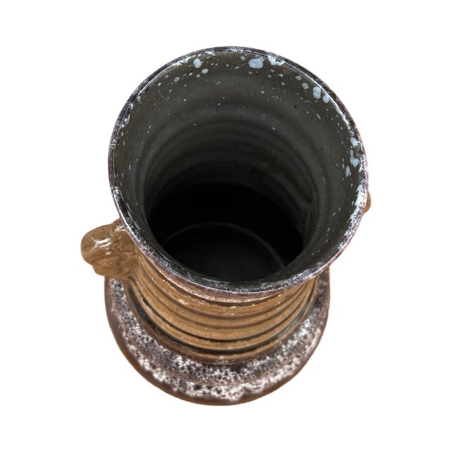 A hand-painted ceramic cup-type vase in the New Look style with fat lava painting, produced by Strehla Keramik in Germany...