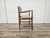 An elegant Scandinavian armchair, characterized by organic lines and harmonious proportions that express all the...