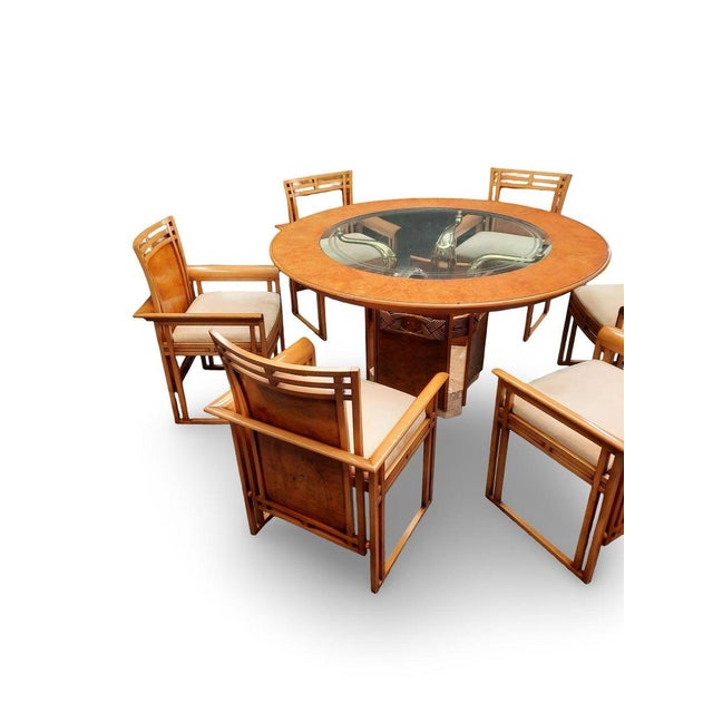 A rare dining set by Frank Pollaro (USA). As shown in the photos, the set consists of a dining table and six chairs. The...