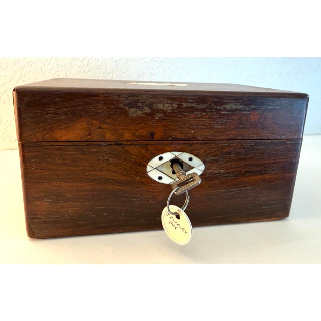 Vintage 1770 rosewood jewelry box found in Acton Castle in England. It has beautiful patina with wood grain, mother of...