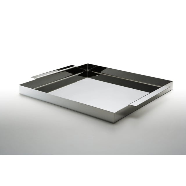 This is a smooth and shiny silver alloy Gaia tray.