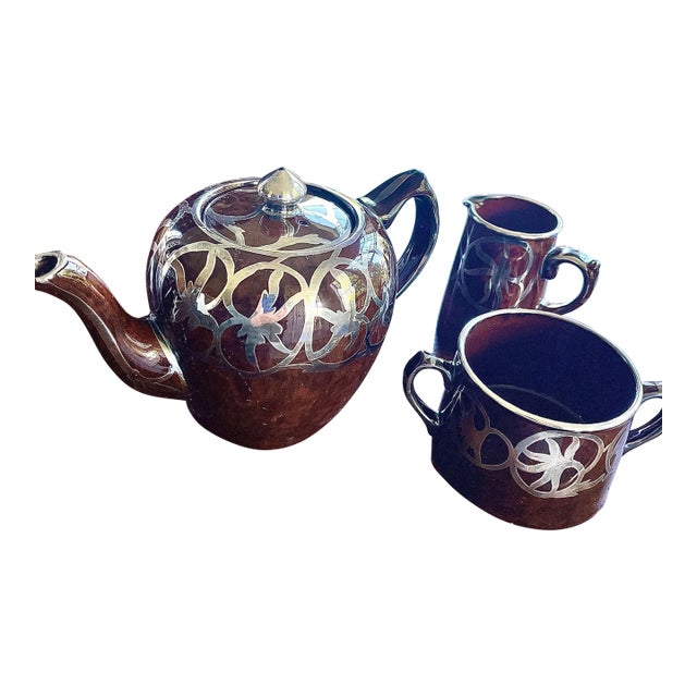 Mid 20th Century Brown Glazed Porcelain Teapot, Sugar Bowl & Creamer Set With Silver Overlay in Art Nouveau Design- 3 Pieces For Sale