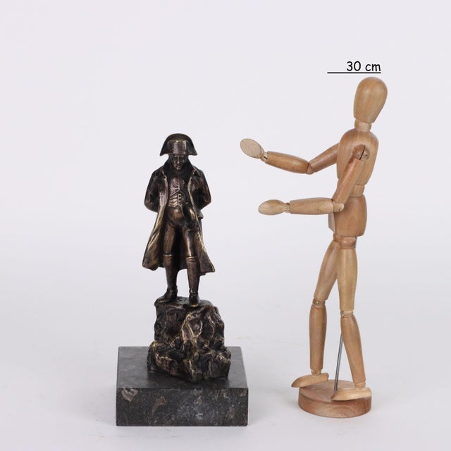 Bronze sculpture depicting Napoleon Bonaparte in exile on Saint Helena. Base in black marble. Author's signature difficult...