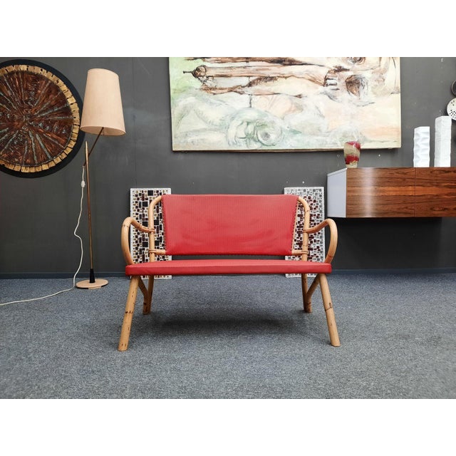 Very stylish bamboo bench from the golden fifties. A real eye-catcher for the rockabilly fan. Made of bamboo and faux...