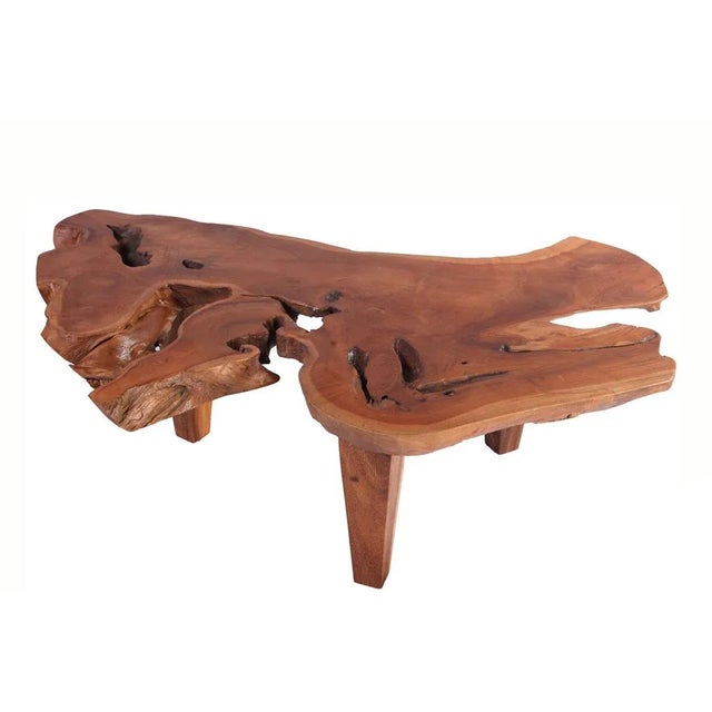 This coffee table is made of one single slab of reclaimed teak wood. The top of this table is carefully cut, sand ,and...
