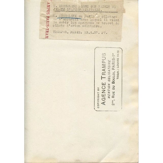 Mussolini In Command' is a b/w photographic print on glazed paper, the stamp of agency Trampus, Paris and cliché applied...