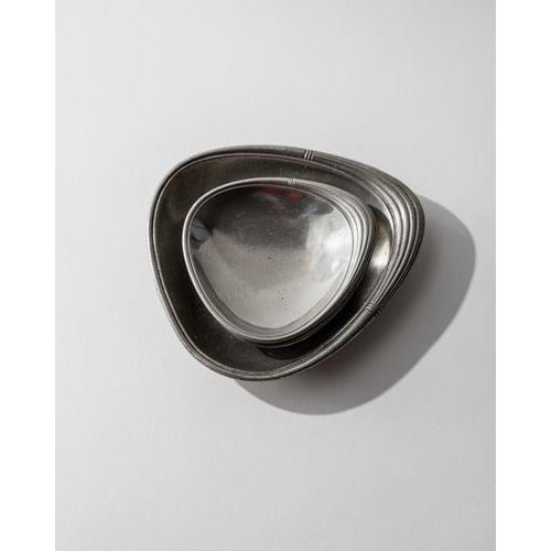 This vintage set of 3 pewter bowls from the 1960s by Just Denmark showcases refined Scandinavian design in an elegant...