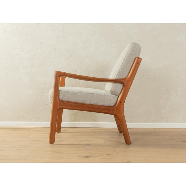 SENATOR armchair from the 1960s by Ole Wanscher for France & Søn. Solid teak frame. The original spring core has been...